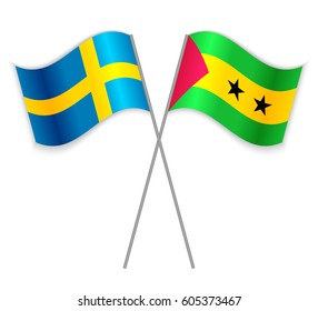 Swedish and Sao Tomean crossed flags. Sweden combined with Sao Tome and Principe isolated on white. Language learning, international business or travel concept.