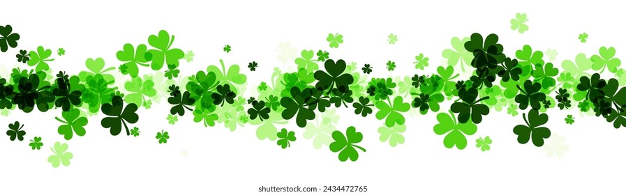 A sweeping band of clover silhouettes shades from dark to light green across a panoramic white background, evoking St. Patrick's Day.