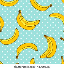 Sweet bananas pattern with polka dots on turquoise background
