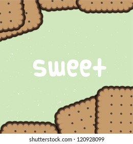 sweet biscuits on green background