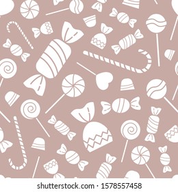 Sweet candy background - Vector seamless pattern solid silhouettes of lollipop, caramel, chocolate and sugar for graphic design