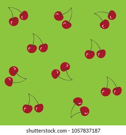 Sweet cherries on a green background