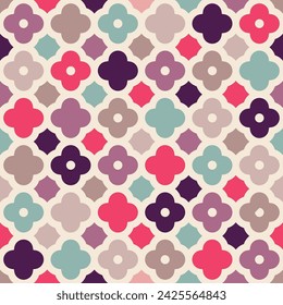 Sweet and colorful pattern in pink and purple shades of geometric flowers.Vector seamless pattern design for textile, fashion, paper, packaging, wrapping and branding