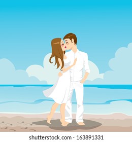 Sweet couple kissing and hugging on the beach dressed in white clothing