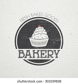 Sweet Cupcakes. Bakery baking. Cafes and eateries. The food and service. Old retro vintage grunge. Scratched, damaged, dirty effect. Labels, stickers, logos and badges. Flat vector illustration