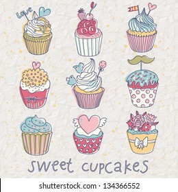 Sweet cupcakes Ã¢Â?Â? vector set. Cartoon tasty cupcakes in pastel colors