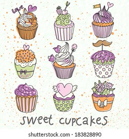 Süße Cupcakes in Vektorset. Cartoon leckere Cupcakes in Pastellfarben