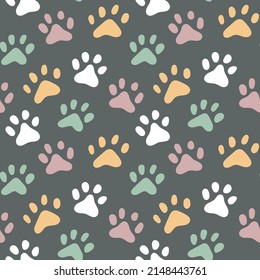 Sweet cute seamless repeat dog puppy pet animal vector pattern on pastel dark background. Colourful paws.