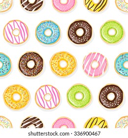 Sweet donuts on the white background. Beautiful and tasty seamless pattern. 