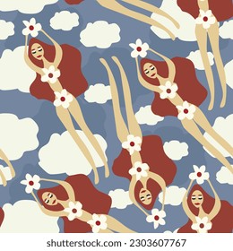 Sweet dreams. Tender women with flowers flying among the clouds in the blue sky.