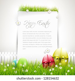 Sweet Easter background with colorful eggs and empty paper on wooden background