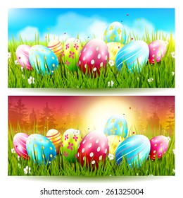 Sweet Easter banners with colorful eggs in the grass