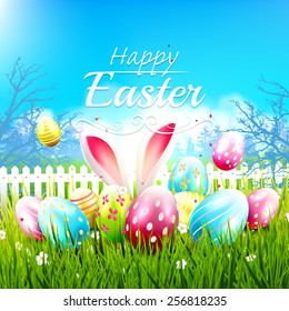 Sweet Easter greeting card with colorful eggs in the grass 