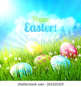 Sweet Easter greeting card with colorful eggs in the grass