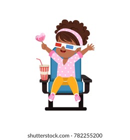 Sweet happy african american little girl in 3d glasses sitting on a blue chair and watching 3D movie in the cinema vector Illustration