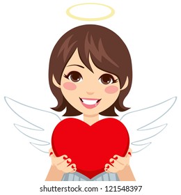 Sweet innocent looking angel cupid brunette woman holding big red heart in hands showing it