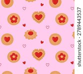 Sweet jam cookies seamless pattern on pink background. Repeat print texture of shortbread biscuits with red fruit jam heart filling and small hearts