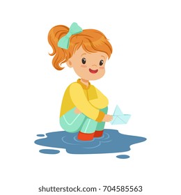 Sweet little girl playing with paper boat in a water puddle cartoon vector Illustration