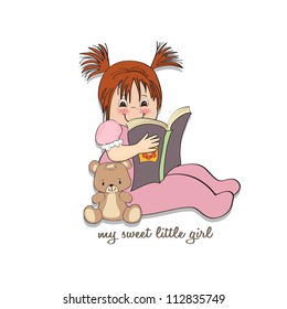 sweet little girl reading a book