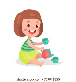 Sweet little girl sitting on the floor playing with toy cups and teapot cartoon vector Illustration