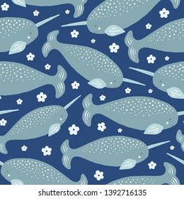 Sweet narwhal and floral seamless repeat pattern in grey and blue. Vector ocean life background design ideal for children.