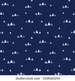 Sweet vector seamless repeat pattern of hand drawn small triangles in blue. and white. A fun abstract repeat design background.