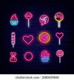 Sweets neon icon collection. Candy shop shiny logo. Cupcake. Cake pop and donut. Lollipop. Bakery emblem set. Luminous label. Night bright signboards on brick wall. Vector stock illustration