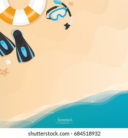 Swim ring and snorkeling accessories on the beach - summer holiday background