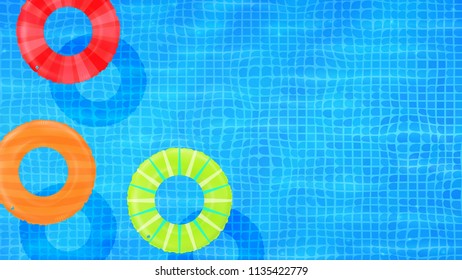Swim rings on swimming pool water background. Inflatable rubber toy. Realistic summertime illustration. Summer vacation or trip safety item. Top view swimming circles.