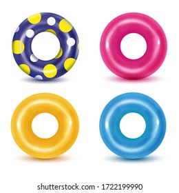 Swim rings on white background. Inflatable rubber toy for  water and beach or trip safety.
Life saving floating lifebuoy for beach or ship, rescue belt for saving people. Vector illustration. 