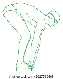 Swimmer wearing cap and goggles on his mark