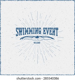 Swimming badges logos and labels for any use. On wooden background texture