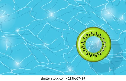 Swimming circle kiwi for ocean, sea, pool on water surface top view. Fruit Swim ring for summer party. Inflatable colorful rubber toy fruit. Lifebyou swimming ring. Summer vacation or trip safety.