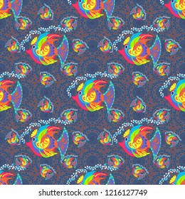 Swimming fishes vector seamless pattern in orange, blue and violet colors. Fish background can be used as print for baby apparel, t-shirts, kids clothes, cards, packaging design.
