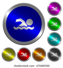 Swimming man icons on round luminous coin-like color steel buttons