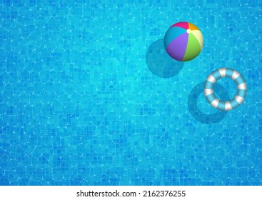 Fondo de la piscina con bola de playa y anillo de goma