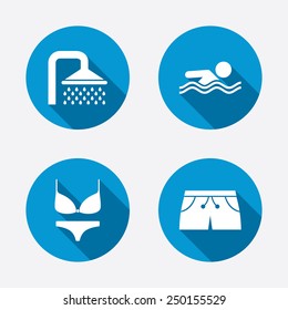 Swimming pool icons. Shower water drops and swimwear symbols. Human swims in sea waves sign. Trunks and women underwear. Circle concept web buttons. Vector