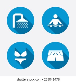 Swimming pool icons. Shower water drops and swimwear symbols. Human stands in sea waves sign. Trunks and women underwear. Circle concept web buttons. Vector