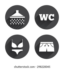 Swimming pool icons. Shower water drops and swimwear symbols. WC Toilet sign. Trunks and women's underwear. Circles buttons with long flat shadow. Vector