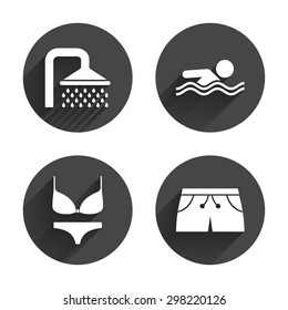 Swimming pool icons. Shower water drops and swimwear symbols. Human swims in sea waves sign. Trunks and women's underwear. Circles buttons with long flat shadow. Vector