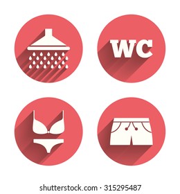 Swimming pool icons. Shower water drops and swimwear symbols. WC Toilet sign. Trunks and women underwear. Pink circles flat buttons with shadow. Vector