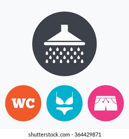 Swimming pool icons. Shower water drops and swimwear symbols. WC Toilet sign. Trunks and women underwear. Circle flat buttons with icon.