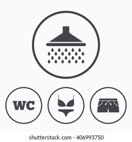 Swimming pool icons. Shower water drops and swimwear symbols. WC Toilet sign. Trunks and women underwear. Icons in circles.