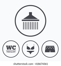 Swimming pool icons. Shower water drops and swimwear symbols. WC Toilet sign. Trunks and women underwear. Icons in circles.