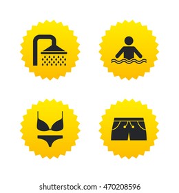Swimming pool icons. Shower water drops and swimwear symbols. Human stands in sea waves sign. Trunks and women underwear. Yellow stars labels with flat icons. Vector