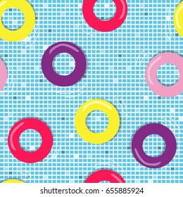 Swimming pool seamless pattern with inflatable colorful rings. Vector illustration.