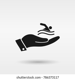 swimming siluette in hand icon. Vector icon 10 EPS