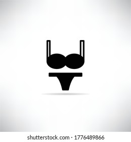 swimsuit icon with shadow on gray background vector illustration