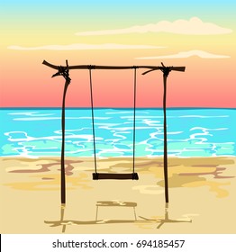 swing on the beach at sunset