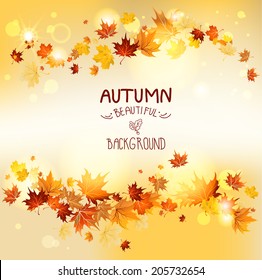 Swirl of maple flying leaves. Beautiful seasonal background with place for text.